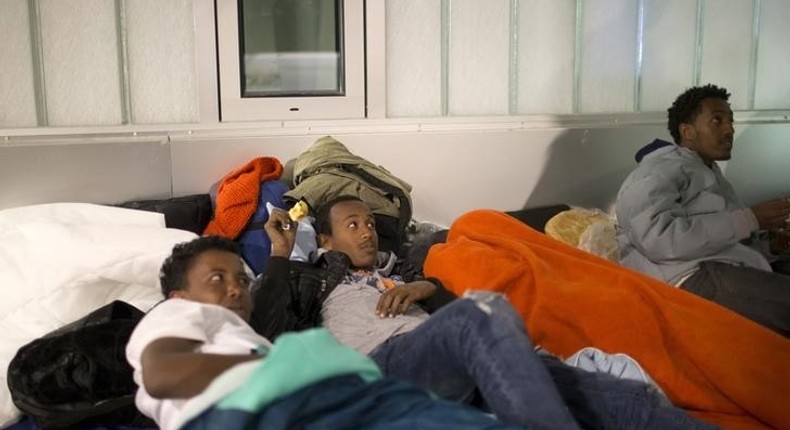 Refugees from Eritrea wait outside Berlin's central registration center for registration which will continue in two days in Berlin, October 3, 2015. REUTERS/Axel Schmidt