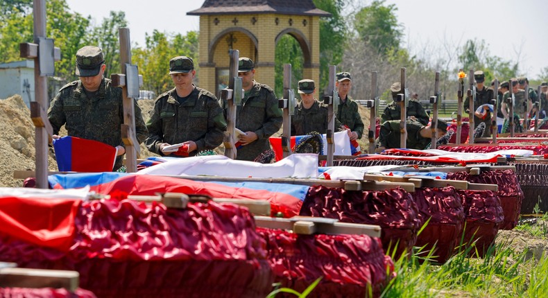 Remains of killed Russian armed forces' soldiers buried in Luhansk.Reuters