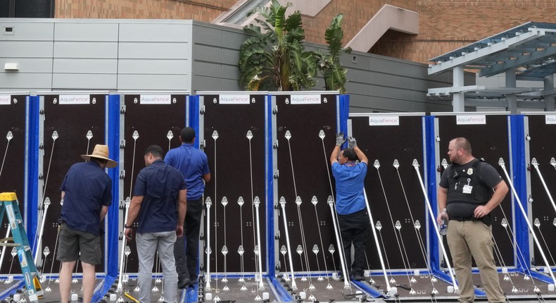 An AquaFence flood wall is placed around Tampa General Hospital ahead of Hurricane Milton's expected mid-week landfall in Tampa, Florida, on October 8, 2024.BRYAN R. SMITH/AFP via Getty Images