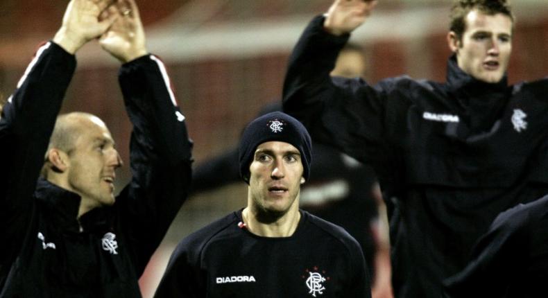 Fernando Ricksen (centre) pictured during his time at Scottish Premiership club Rangers