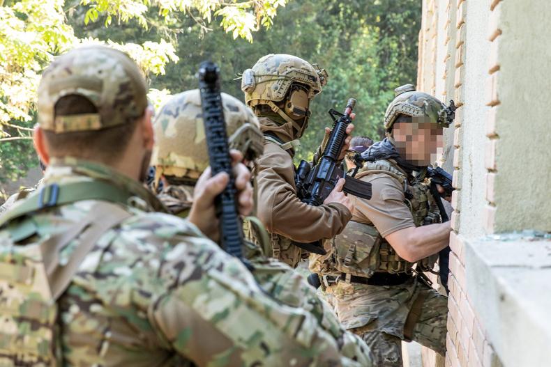 US Navy SEALs, British Royal Marines, and Romanian naval special forces train in Romania during Exercise Trojan Footprint 22, May 6, 2022.