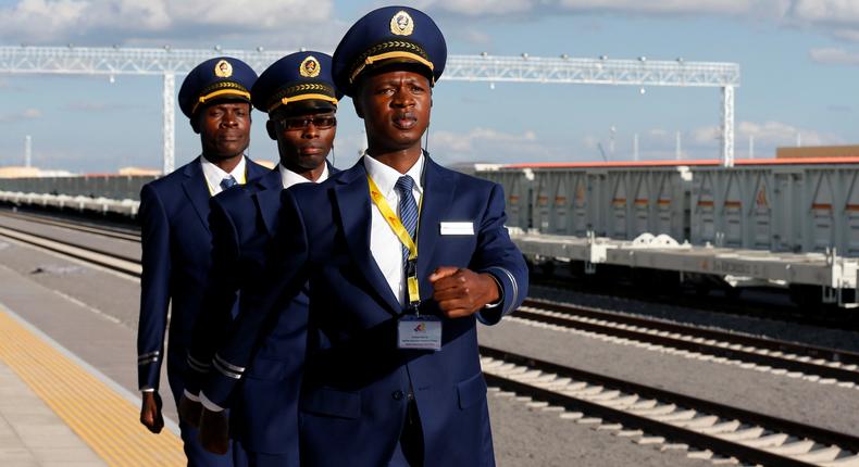 Kenya Railways attendants are seen at the Nairobi Terminus in the outskirts of Nairobi.