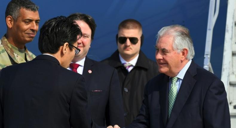 US Secretary of State Rex Tillerson (R) arrives in South Korea after China challenges him to come up with a new way to confront the North Korean nuclear stand-off