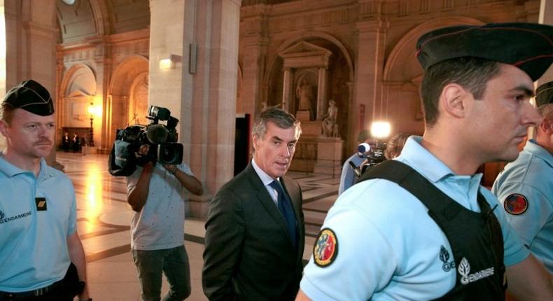 French former budget minister Jerome Cahuzac arrives at the Paris courthouse for his tax fraud trial in September