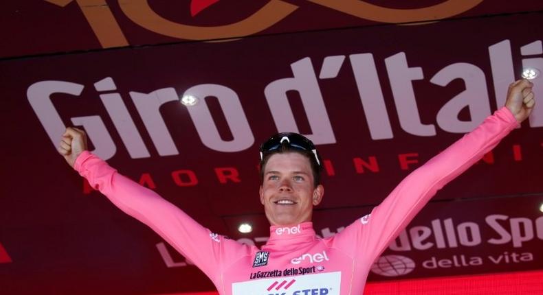 Luxemburg's Bob Jungels of team Quick-Step celebrates the pink jersey of the overall leader on the podium after the 4th stage of the 100th Giro d'Italia, Tour of Italy, on May 9, 2017 in Sicily