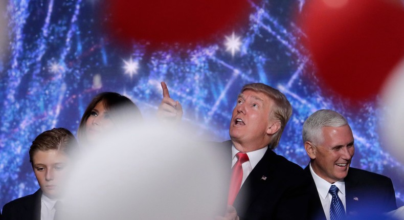 Donald Trump looks at falling balloons at the Republican National Convention in Cleveland on July 21, 2016.J. Scott Applewhite/AP