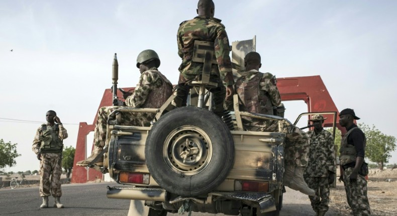 Nigerian soldiers have been battling Boko Haram's insurgency in the northeast region for 10 years [AFP]