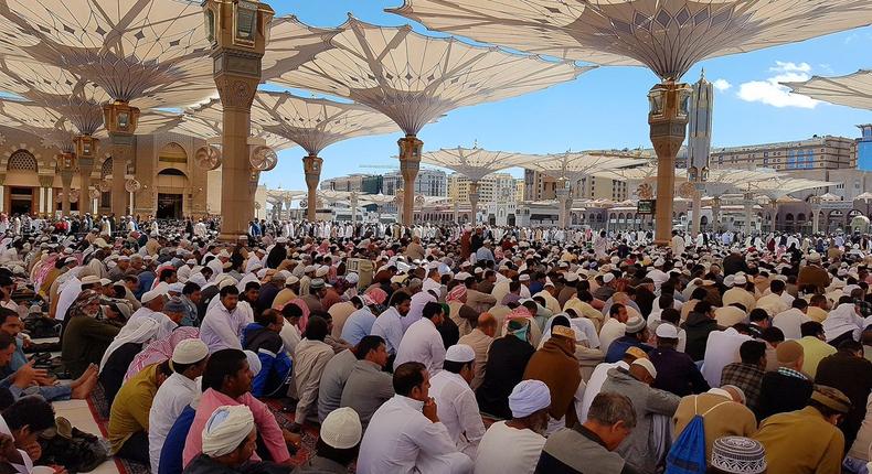 Muslims listening to khutbah