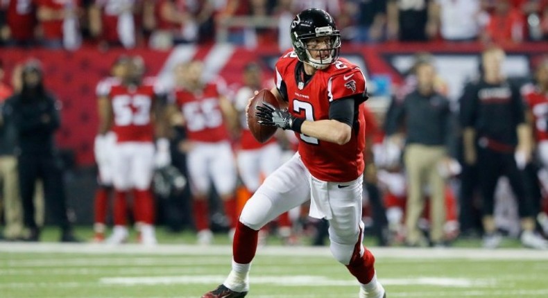 Matt Ryan of the Atlanta Falcons runs the ball against the Seattle Seahawks at the Georgia Dome on January 14, 2017 in Atlanta, Georgia