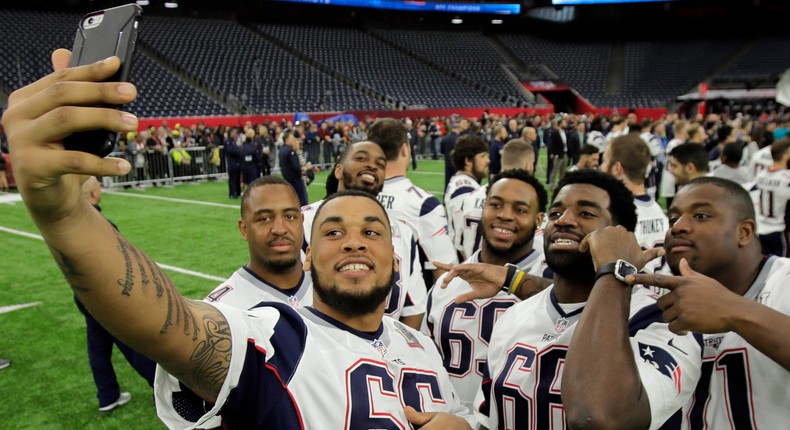 Players from the New England Patriots take a selfie before Super Bowl 51.