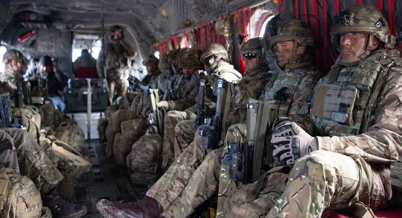 British and US soldiers are transported to a training mission in a US Army 12th Combat Aviation Brigade Chinook helicopter near Rena, Norway on October 27, 2018.