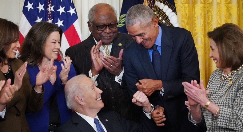 President Joe Biden fist bumps with former President Barack Obama during a 2022 signing ceremony for an executive order related to the Affordable Care Act.Mandel Ngan/AFP via Getty Images