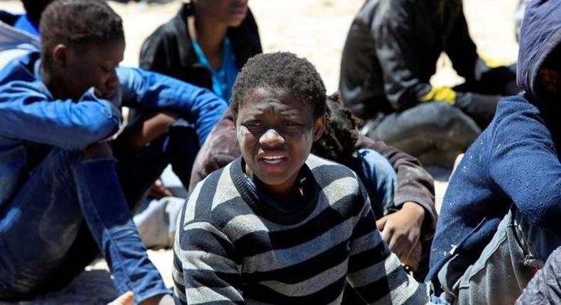 Migrants, who attempted to flee the Libyan coast to head to Europe, are seen after being detained at the coast guard center in the coastal city of Tripoli, Libya, May 16, 2016. 