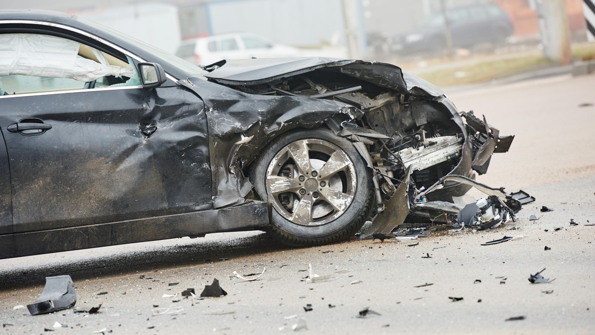 car crash accident on street, damaged automobile after collision in city