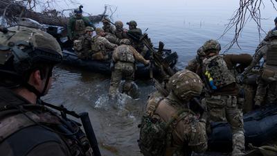 Ukrainian servicemen board a boat on the shore of Dnipro river at the frontline near Kherson, Ukraine, Sunday Oct. 15, 2023.AP Photo/Mstyslav Chernov, File