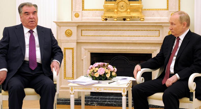 Russian President Vladimir Putin, right, and Tajik President Emomali Rahmon at the Kremlin on May 16, 2022.