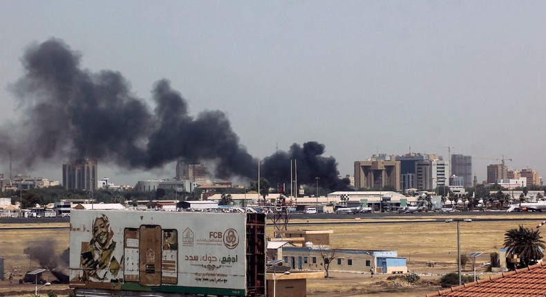 Heavy smoke bellows above buildings in the vicinity of the Khartoum's airport on April 15, 2023, amid clashes in the Sudanese capital.AFP/Getty Images