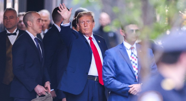 Former US President Donald Trump departs Trump Tower for the opening of his first criminal trial.CHARLY TRIBALLEAU/AFP via Getty Images