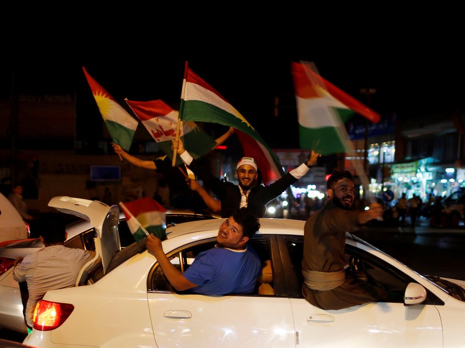 Kurds celebrate to show their support for the independence referendum in Erbil, Iraq September 25, 2017.