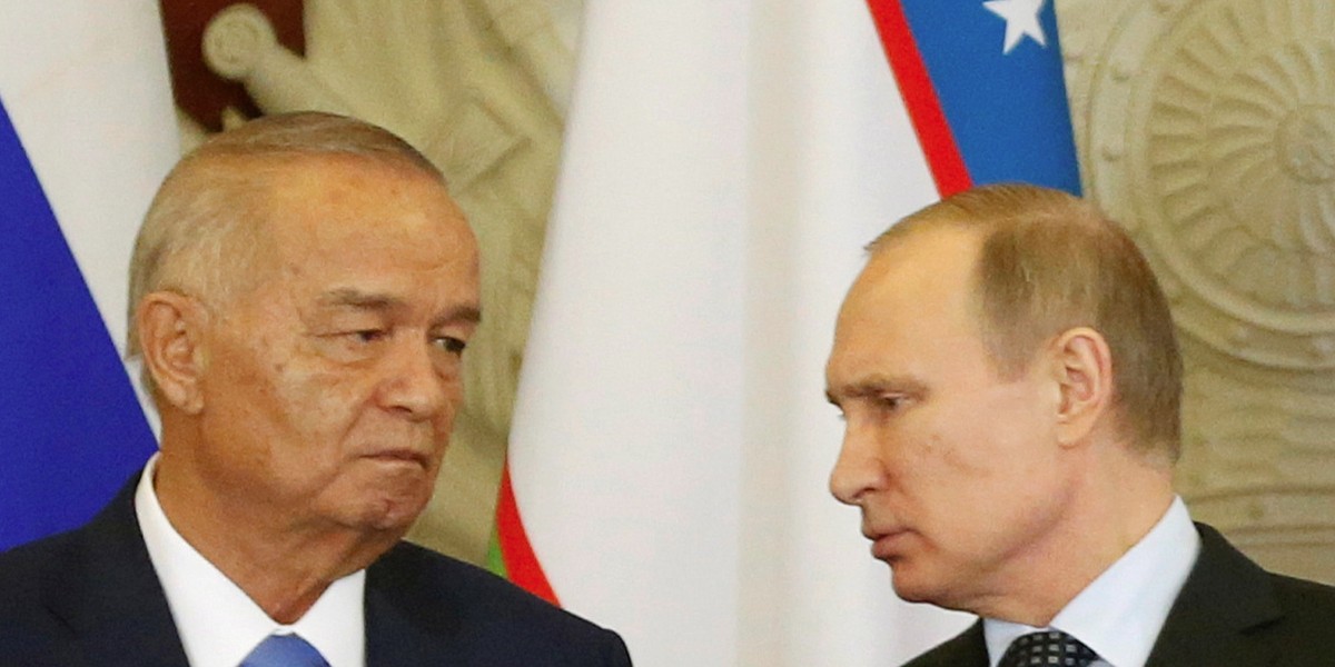 Russian President Vladimir Putin, right, with Uzbek President Islam Karimov.