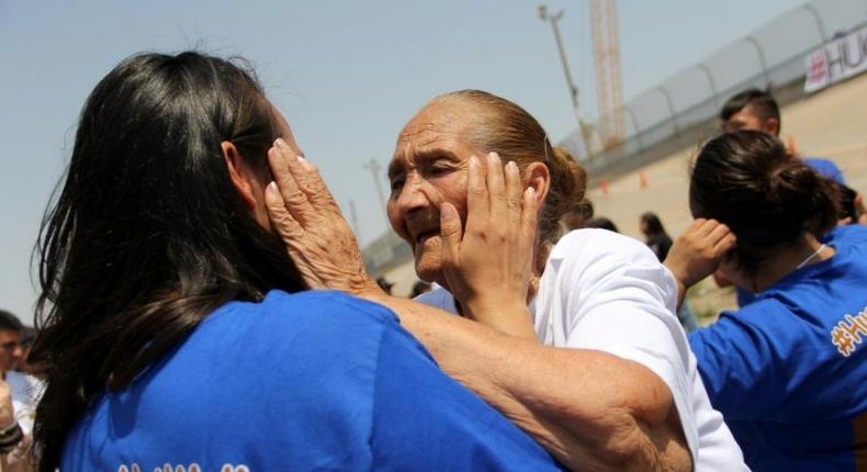 Families separated by the US-Mexico border are reunited for a few minutes in a Hugs Not Walls event in Ciudad Juarez, Mexico on June 24, 2017