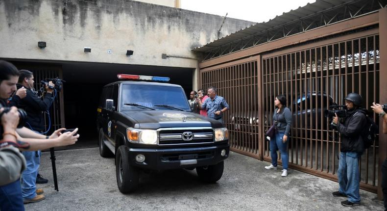 A vehicle used by Venezuela's military counterintelligence agency, the DGCIM, outside the home of opposition leader Juan Guaido's uncle during a search on Thursday