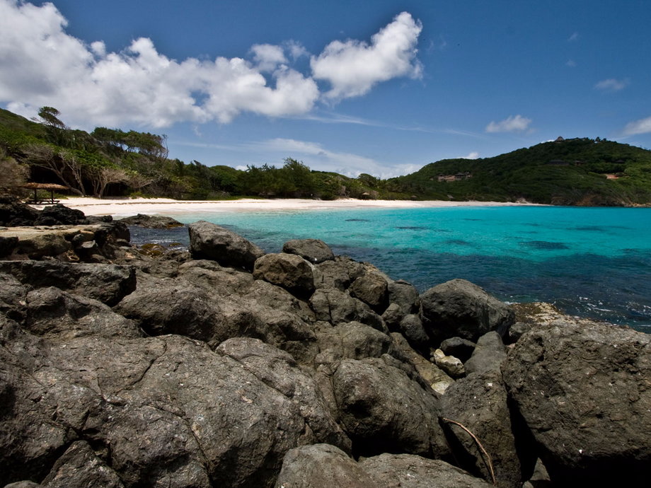The private island of Mustique, which is located in St. Vincent and the Grenadines, has long been a popular celebrity hideaway, with its idyllic Macaroni Beach being a favorite. The beach hosts sweeps of soft sand, clear waters for snorkeling and diving, and romantic picnics to enjoy.