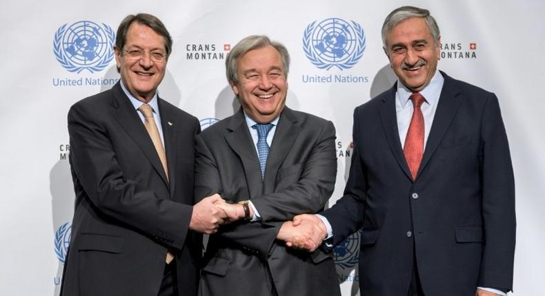 UN chief Antonio Guterres, seen here between Greek Cypriot President Nicos Anastasiades (L) and Turkish Cypriot Leader Mustafa Akinci (R), is heading to Switzerland to press them to reach a historic agreement on reunifying Cyprus.