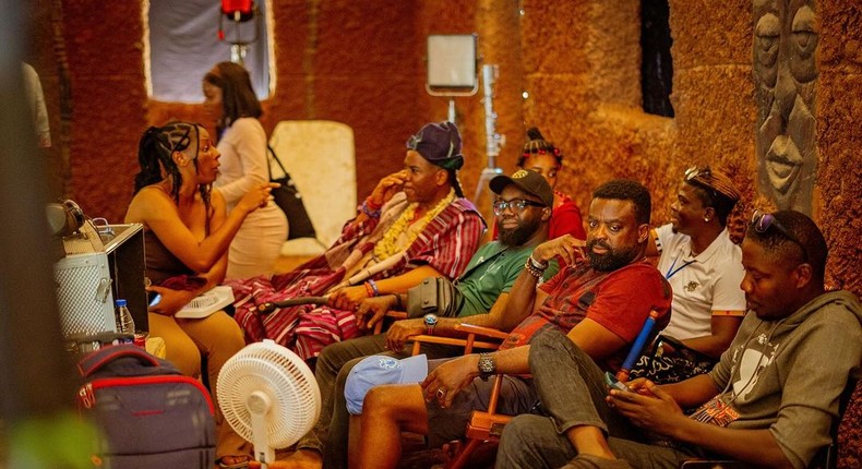 Kunle Afolayan on the set of Aníkúlápó the series [Instagram/KunleAfo]