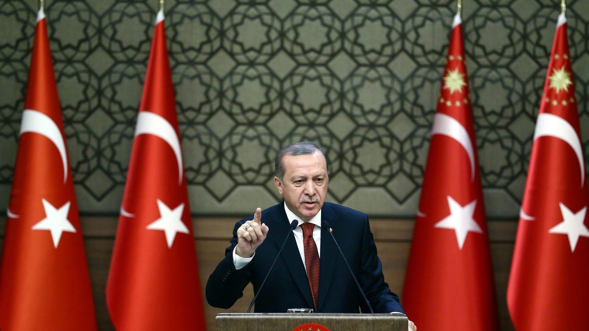 Turkish President Tayyip Erdogan makes a speech during his meeting with mukhtars at the Presidential