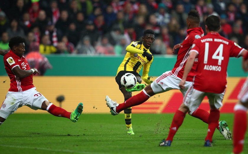 Borussia Dortmund's Ousmane Dembele scores their third goal