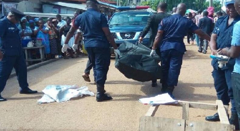 Police carry dead body