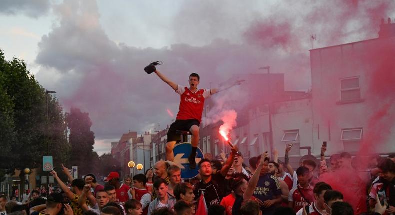 Even with the stadium closed, Arsenal fans celebrated outside the Emirates stadium in north London when their team won the English FA Cup earlier this month