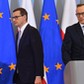 Premier Mateusz Morawiecki i wiceminister finansów Artur Soboń