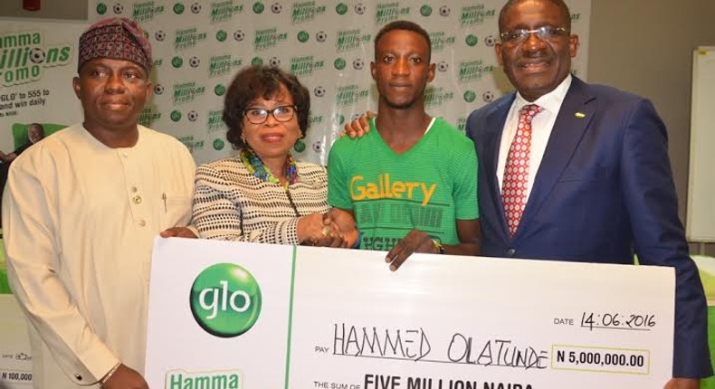 L-R: Hon. Suraju Adekunbi, Speaker, Ogun State House of Assembly; Mrs. Gladys Talabi, Executive Director, Legal Services, Globacom; Hamed Olatunde, N5 Million Winner, and Mr  Waheed Olagunju, Acting Managing Director, Bank of Industry, at the formal presentation of prizes to the first set of winners in the Glo Hamma Millions Promo at Mike Adenuga Towers, Victoria Island, Lagos, on Tuesday.