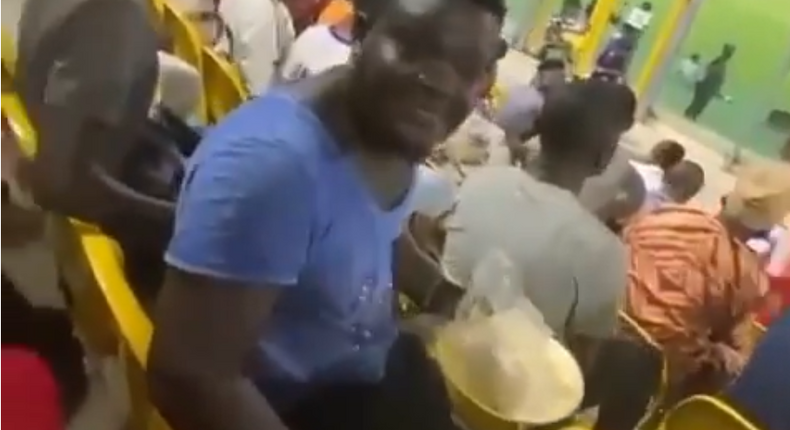 Hearts of Oak fan goes viral for eating banku inside stadium during live match