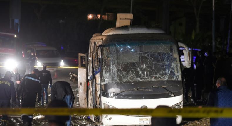 This picture taken on December 28, 2018 shows the scene of an attack on a tourist bus near the Giza Pyramids outside Cairo