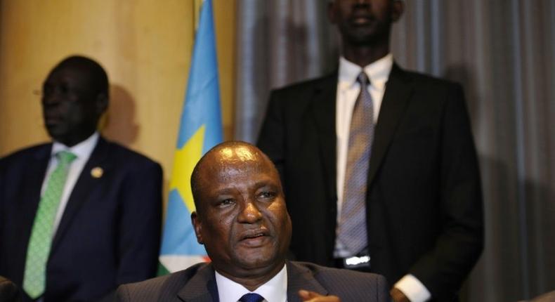 Newly appointed South Sudan First Vice President, Taban Deng Gai (centre) speaks during a press conference in the Kenyan capital, Nairobi on August 17, 2016 