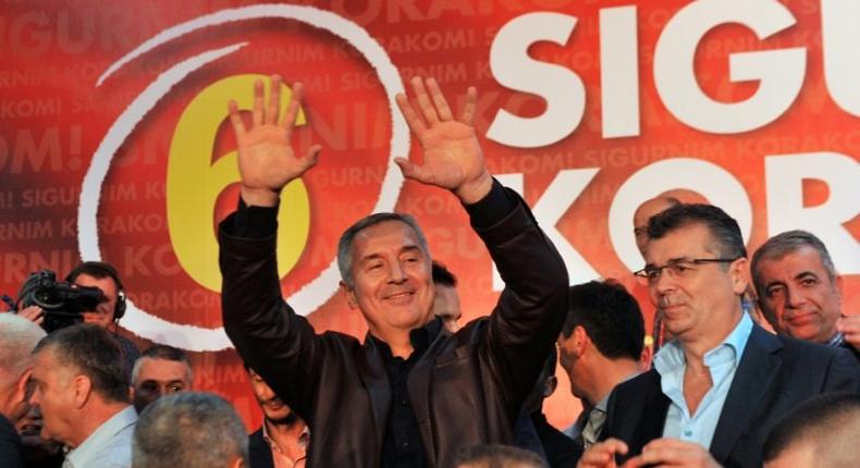 Montenegrin Prime Minister Milo Djukanovic and leader of ruling Democratic Party of Socialists celebrates after parliamentary elections in Podgorica on October 17, 2016