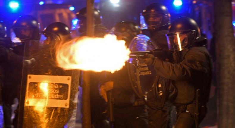 Anti-riot police in action against pro-separatist demonstrations in Catalonia on October 17