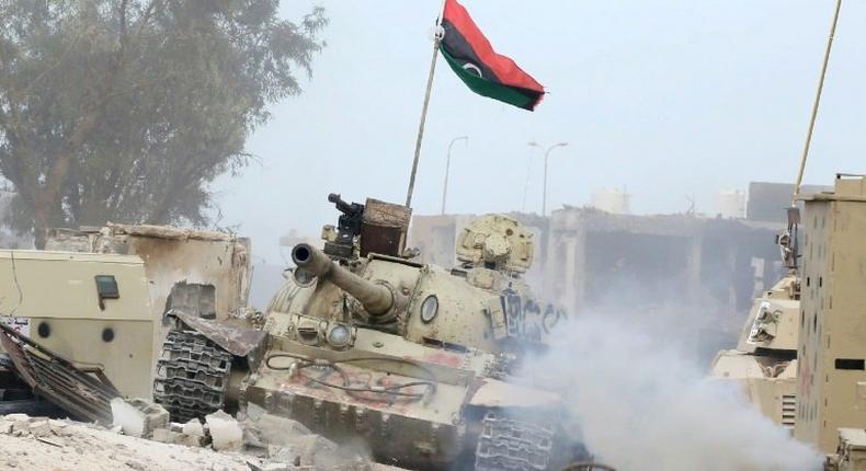 A T-54 tank belonging to forces loyal to Libya's Government of National Accord takes position in Sirte's Al-Giza Al-Bahriya district on November 21, 2016