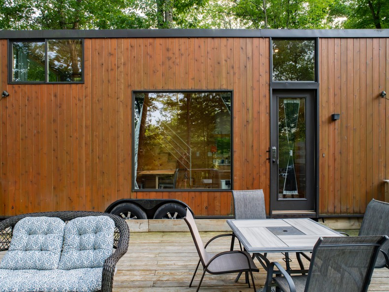 The wooden deck had a table for four, cushioned seating in front of a wood-burning fire pit, and a propane-fueled grill. It seemed like plenty of space for five to hang out and eat.I used the space to work, read, and do yoga.