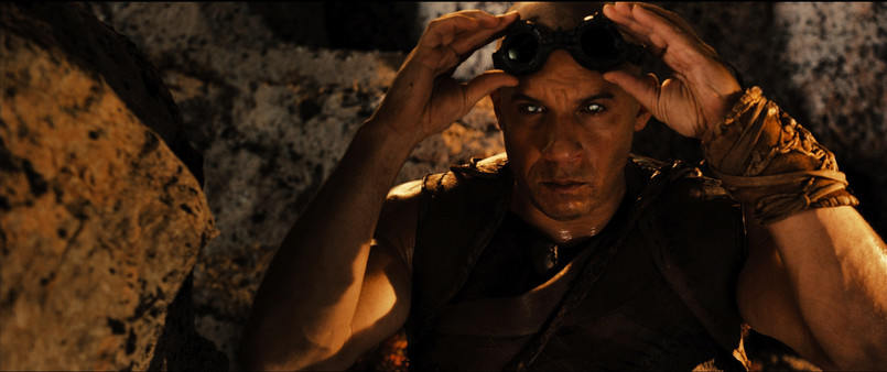 Riddick zostaje porzucony przez swoich wrogów na bezludnej planecie. Niczym Robinson Crusoe konstruuje broń i narzędzia, zastawia pułapki, oswaja nawet hienopodobnego stwora, ale przede wszystkim próbuje przetrwać osaczony przez żądne jego krwi potwory