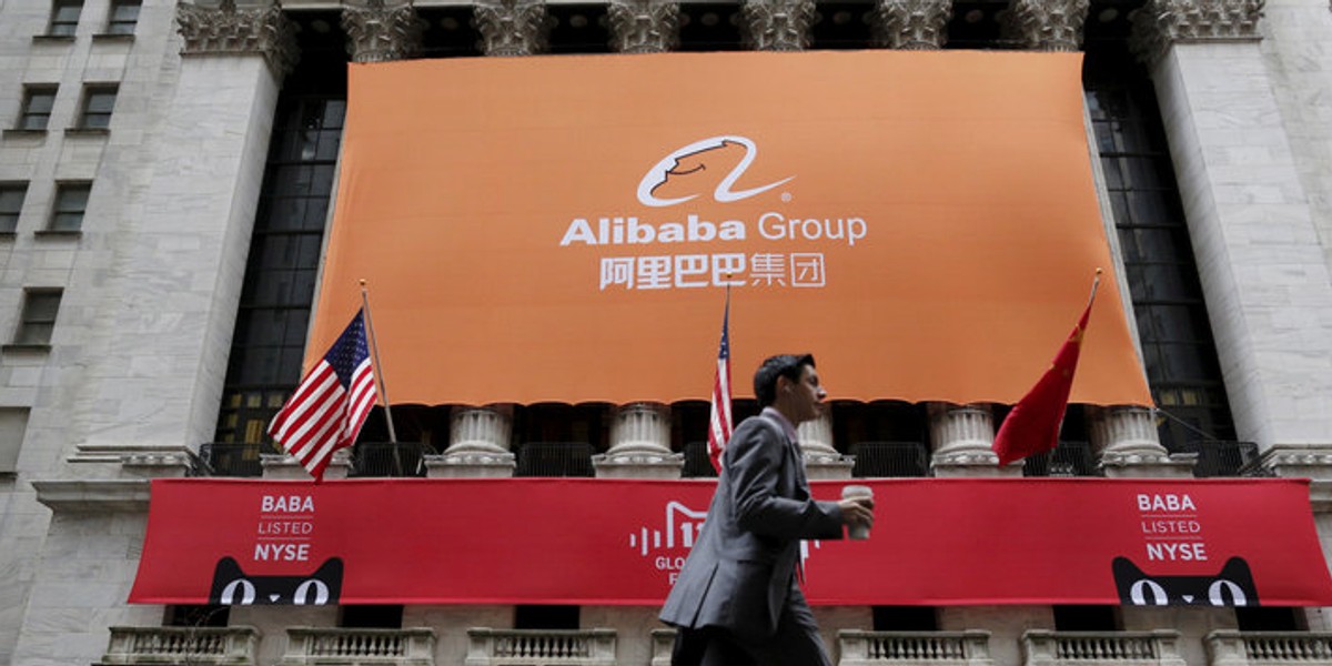 Signage for Alibaba Group Holding Ltd. covers the front facade of the New York Stock Exchange