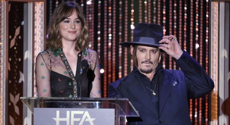 Dakota Johnson and Johnny Depp at the Hollywood Film Awards