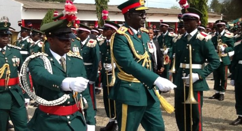 Chief of Army Sstaff, Lt-Gen. Tukur Buatai (R) inspecting parade during the Passing Out Parade of recruits at the Depot Nigerian Army (NAN)