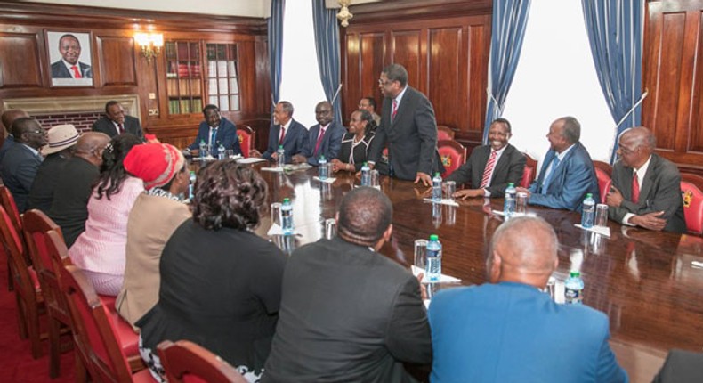 President Uhuru Kenyatta and Raila Odinga with members of the Building Bridges Initiative taskforce at State House