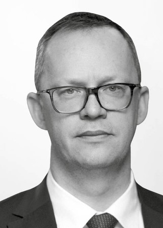 Jarosław Bełdowski, adiunkt w Szkole Głównej Handlowej w Warszawie, wiceprezes Kredobanku