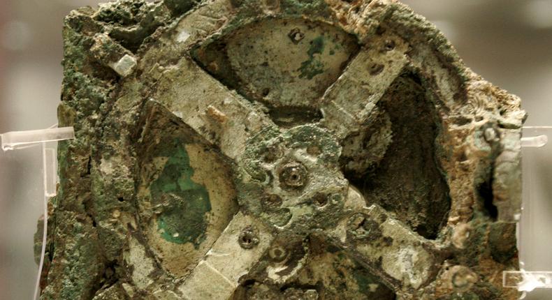 A fragment of the 2,200-year-old Antikythera Mechanism, believed to be the earliest surviving mechanical computing device, is seen at the National Archaeological Museum in Athens.Associated Press/Thanassis Stavrakis