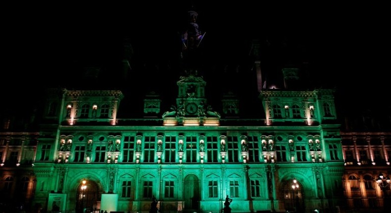 The City Hall of Paris illuminated in green following the announcement by US President Donald Trump that the United States will withdraw from the 2015 Paris accord